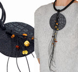 Black geometric necklace with Amber nuggets