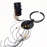 Black geometric necklace with Amber nuggets