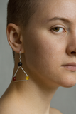 triangle-shaped earring with amber beads.