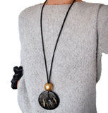 Long necklace with chunky geometric pendants