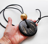 Long necklace with chunky geometric pendants