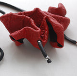 Long red eye-catching necklace