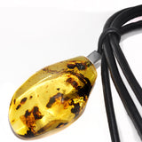 Massive_Amber_pendant_with_inclusions